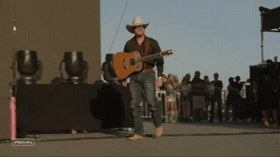 Man In Cowboy Hat Holding Guitar GIF