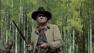 Man In Cowboy Hat Holding Gun Forest Movieclips.com GIF