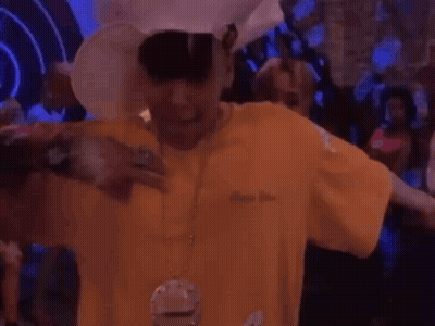 Man In Cowboy Hat Holding Microphone GIF