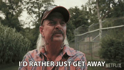 Man In Cowboy Hat Holding Small White Tiger GIF