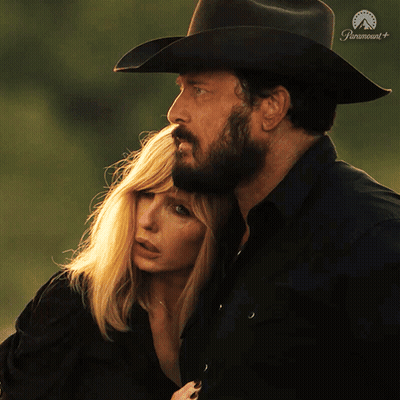 Man In Cowboy Hat Hugging Woman In Front Of Paramount+ Logo GIF