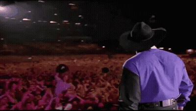 Man In Cowboy Hat In Front Of Crowd GIF