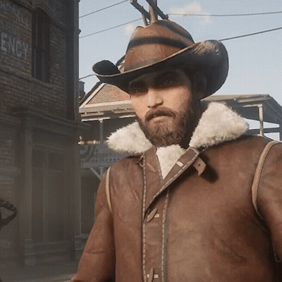 Man In Cowboy Hat In Front Of Engy Building GIF