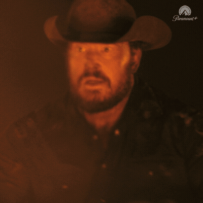 Man In Cowboy Hat In Front Of Paramount Logo GIF
