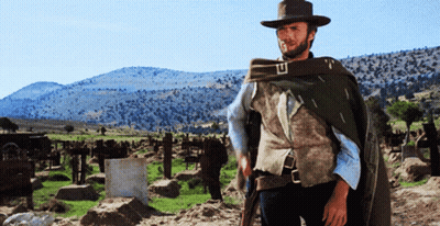 Man In Cowboy Hat In Graveyard GIF