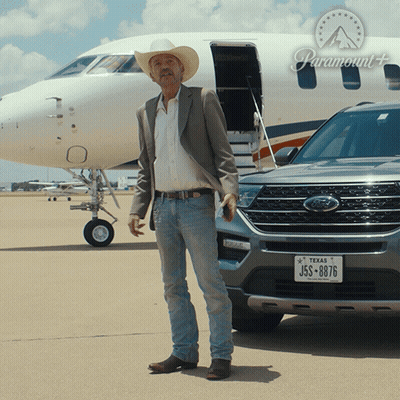 Man In Cowboy Hat Next To Ford Vehicle GIF