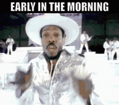 Man In Cowboy Hat On Stage Early Morning GIF