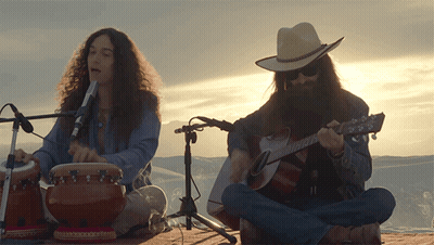 Man In Cowboy Hat Playing Guitar GIF