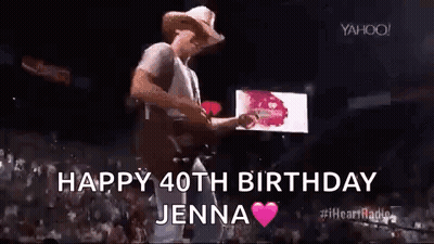 Man In Cowboy Hat Playing Guitar On Stage GIF
