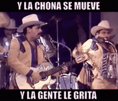 Man In Cowboy Hat Playing Guitar With Microphone GIF