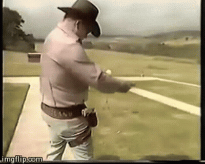 Man In Cowboy Hat Pointing Gun At Target GIF