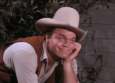 Man In Cowboy Hat Resting Hand On Chin GIF