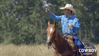 Man In Cowboy Hat Riding Horse GIF