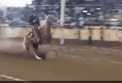 Man In Cowboy Hat Riding Horse On Dirt Track GIF