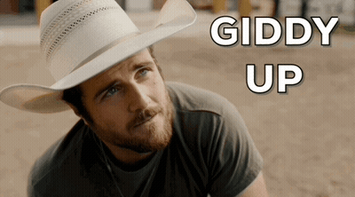 Man In Cowboy Hat Saying Giddy Up GIF