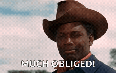 Man In Cowboy Hat Saying Much Obliged GIF