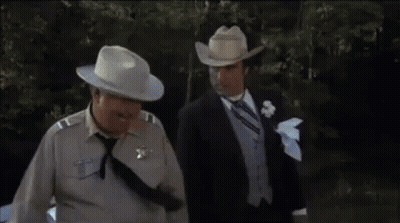 Man In Cowboy Hat Says What The Hell Is The World Comin' To GIF