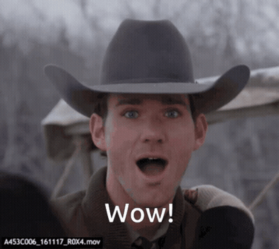Man In Cowboy Hat Says Wow With Mouth Open GIF