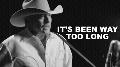 Man In Cowboy Hat Singing Into Microphone It's Been Way Too Long GIF