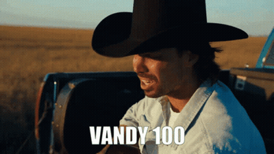Man In Cowboy Hat Sitting In Truck With Vandy 100 GIF