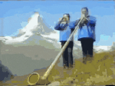 Man In Cowboy Hat Standing In Desert With Hands Up GIF