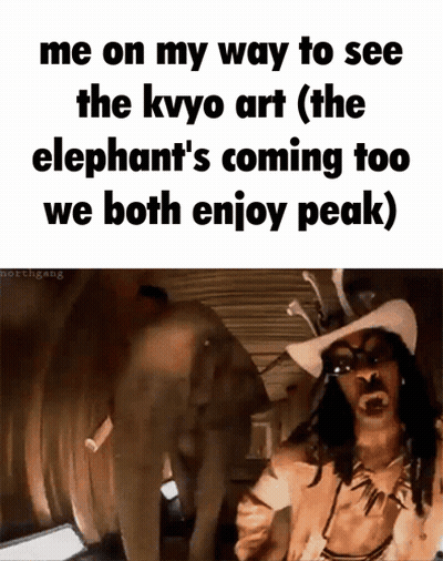 Man In Cowboy Hat Standing Near Elephant GIF