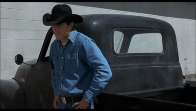Man In Cowboy Hat Standing Next To Truck GIF