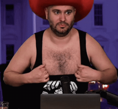 Man In Cowboy Hat Taking Off Black Tank Top GIF