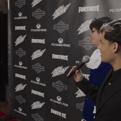 Man In Cowboy Hat Talking Into Microphone Fortnite Backdrop GIF