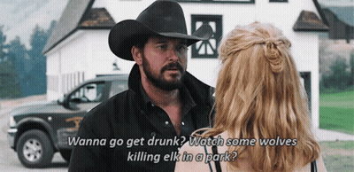 Man In Cowboy Hat Talking To Woman In Front Of House GIF