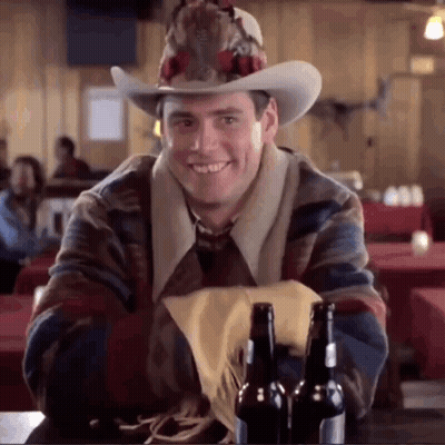 Man In Cowboy Hat With Beer Bottles GIF