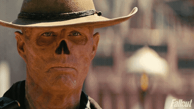Man In Cowboy Hat With Skull On Face GIF