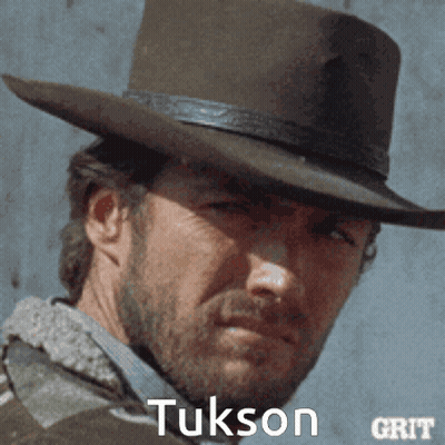 Man In Cowboy Hat With Tuxson GIF