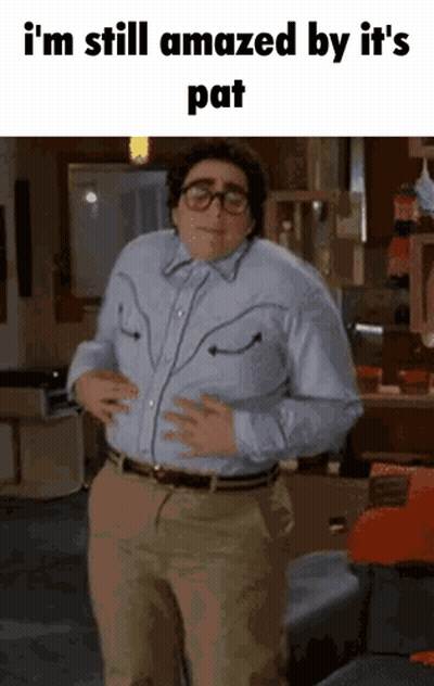 Man In Cowboy Shirt Holding Belly Saying I'm Still Amazed GIF