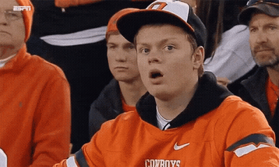 Man In Cowboys Jersey Surprised Watching Game GIF