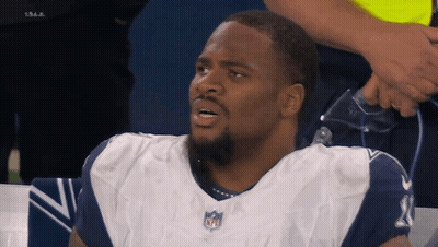 Man In Cowboys Jersey With NFL Logo GIF
