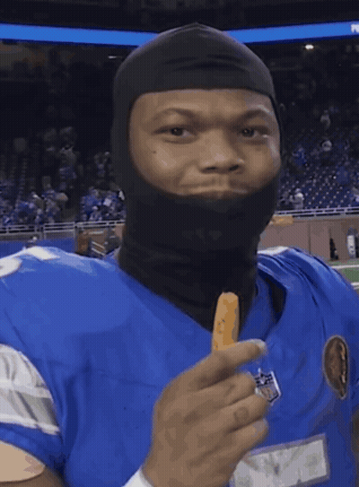 Man In Crown And Fur Coat Praying Before Crowd GIF