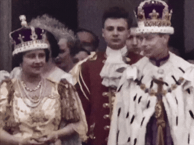 Man In Crown With King Text Next To Woman GIF