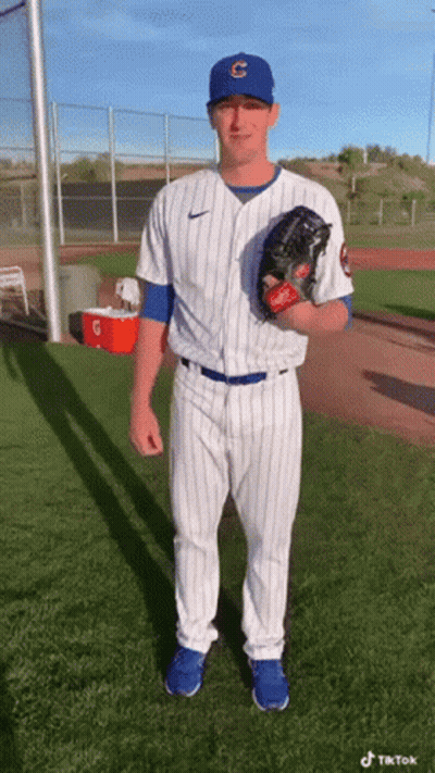 Man In Cubs Uniform Holding Baseball Glove GIF