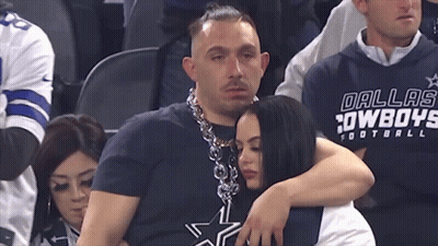 Man In Dallas Cowboys Shirt Hugging Woman GIF