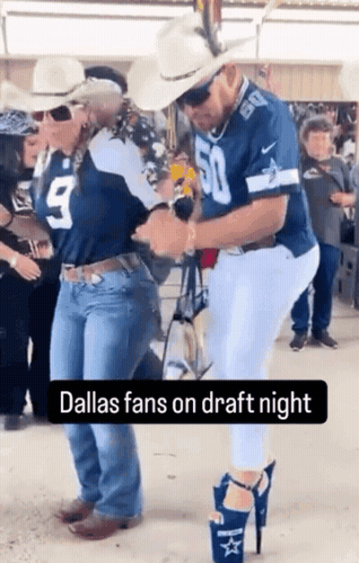 Man In Dallas Jersey Dancing With Woman In Cowboy Boots GIF