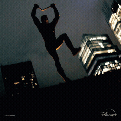 Man In Daredevil Costume Jumping GIF