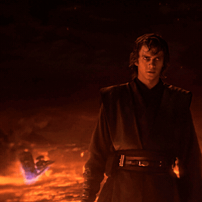 Man In Dark Costume With L Belt GIF