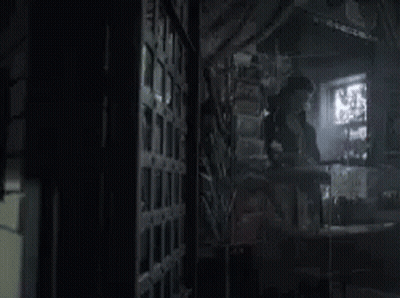 Man In Dark Room Holding Knife And Sword GIF
