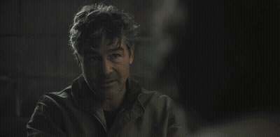 Man In Dark Room Saying Holy Shit You Are An Alien GIF