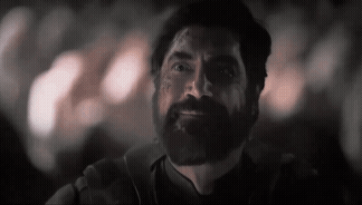 Man In Dark Room Saying Holy Shit You Are An Alien GIF