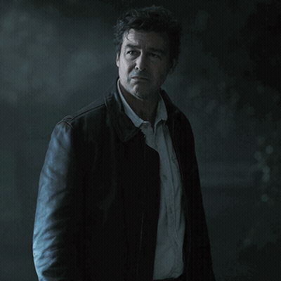Man In Dark Room Saying What The Hell Are You GIF