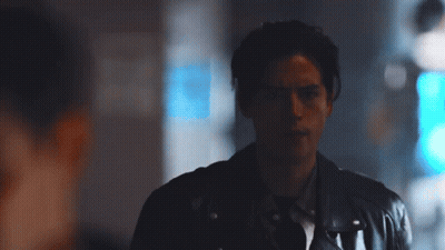 Man In Dark Room With Blue Light GIF