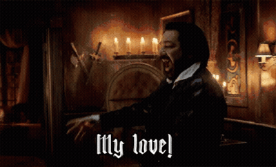 Man In Dark Room With Candles Says My Love GIF