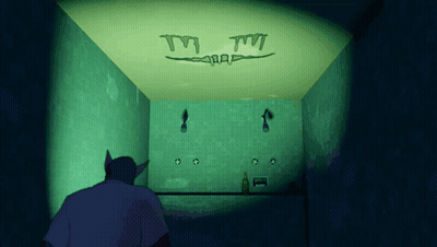 Man In Dark Room With Glowing TM Sign GIF